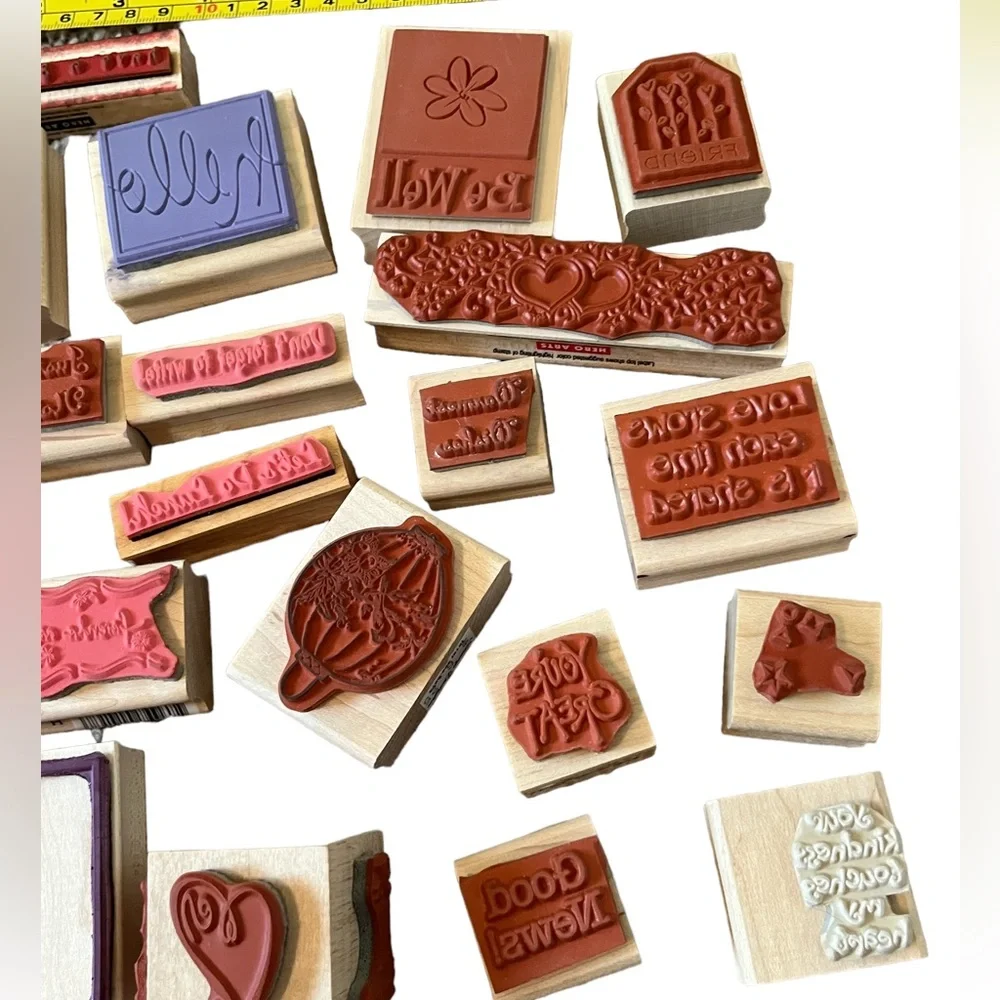 Lot of 20 rubber stamps. Most of the stamps are brand new.
